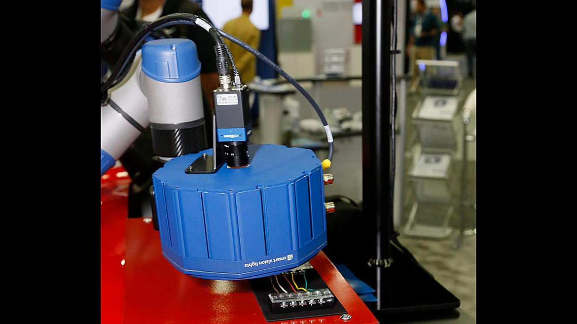 Figure 2: A multifunctional lighting unit attached to a machine vision camera performs an inspection during a tradeshow demonstration.