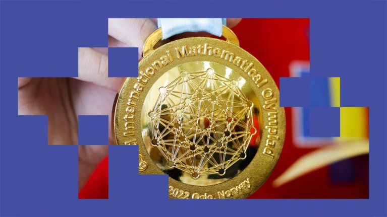 A participant holds up a gold medal won at at the 63rd International Mathematical Olympiad.